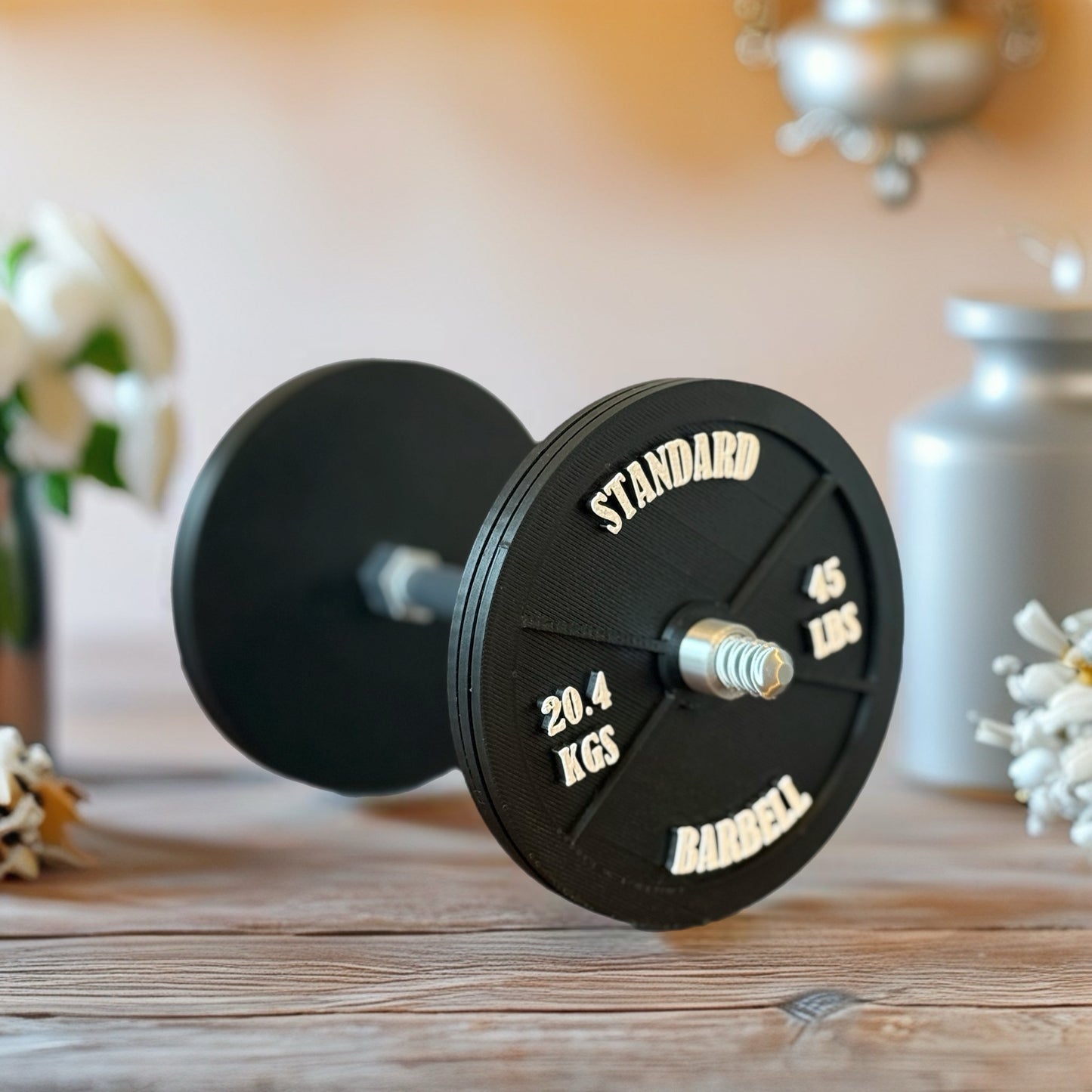 Realistic black dumbbell shaped coaster for gym lovers, 3D printed fitness-themed drink coaster, masculine home gym decor, weight plate desk accessory for bodybuilders.