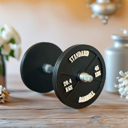 Realistic black dumbbell shaped coaster for gym lovers, 3D printed fitness-themed drink coaster, masculine home gym decor, weight plate desk accessory for bodybuilders.