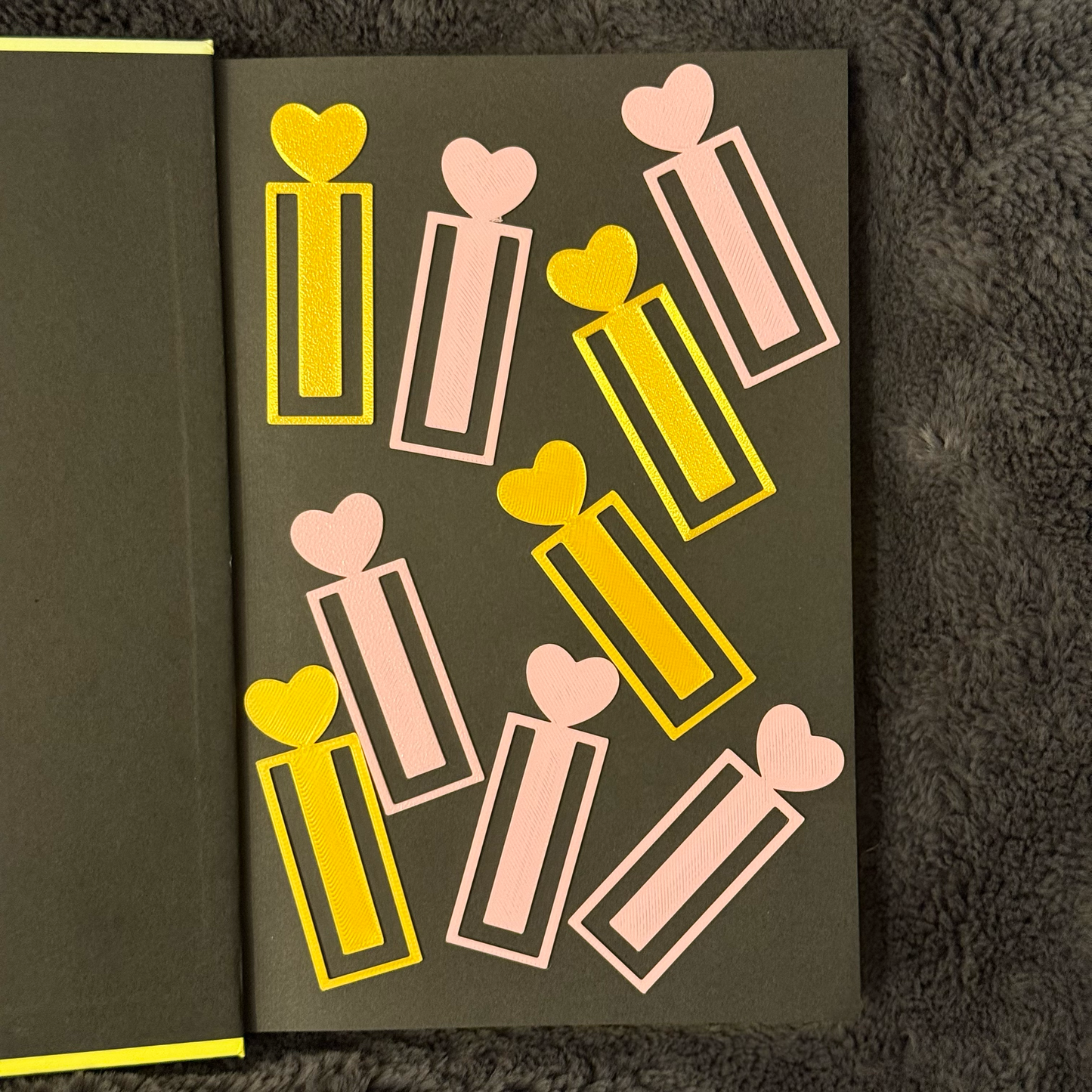 Card with heart and rectangular design on a dark background