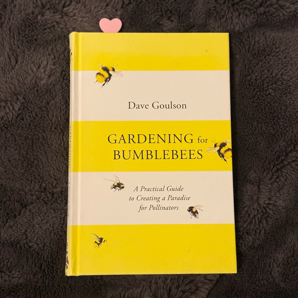 Book titled 'Gardening for Bumblebees' by Dave Goulson on a textured surface.