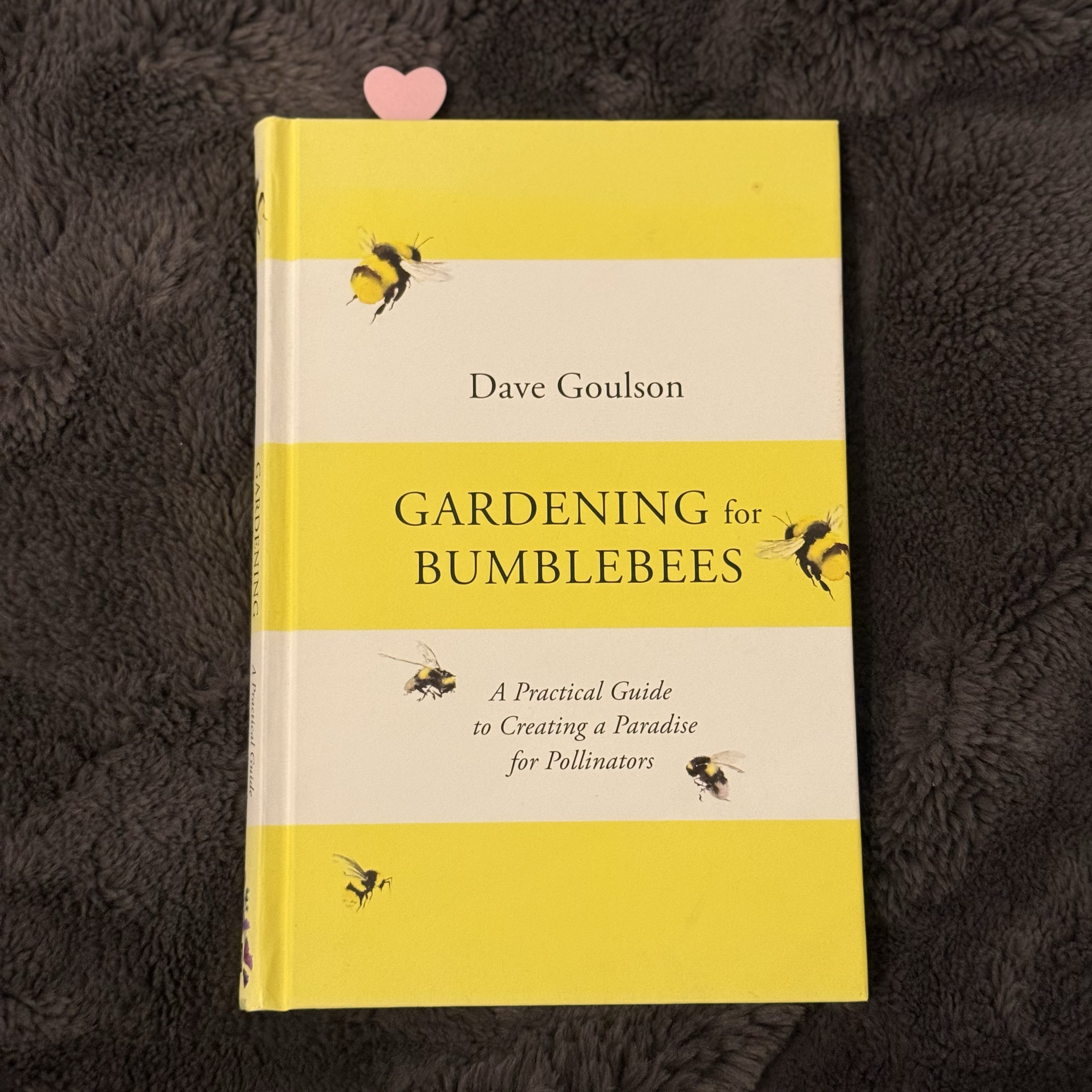 Book titled 'Gardening for Bumblebees' by Dave Goulson on a textured surface.