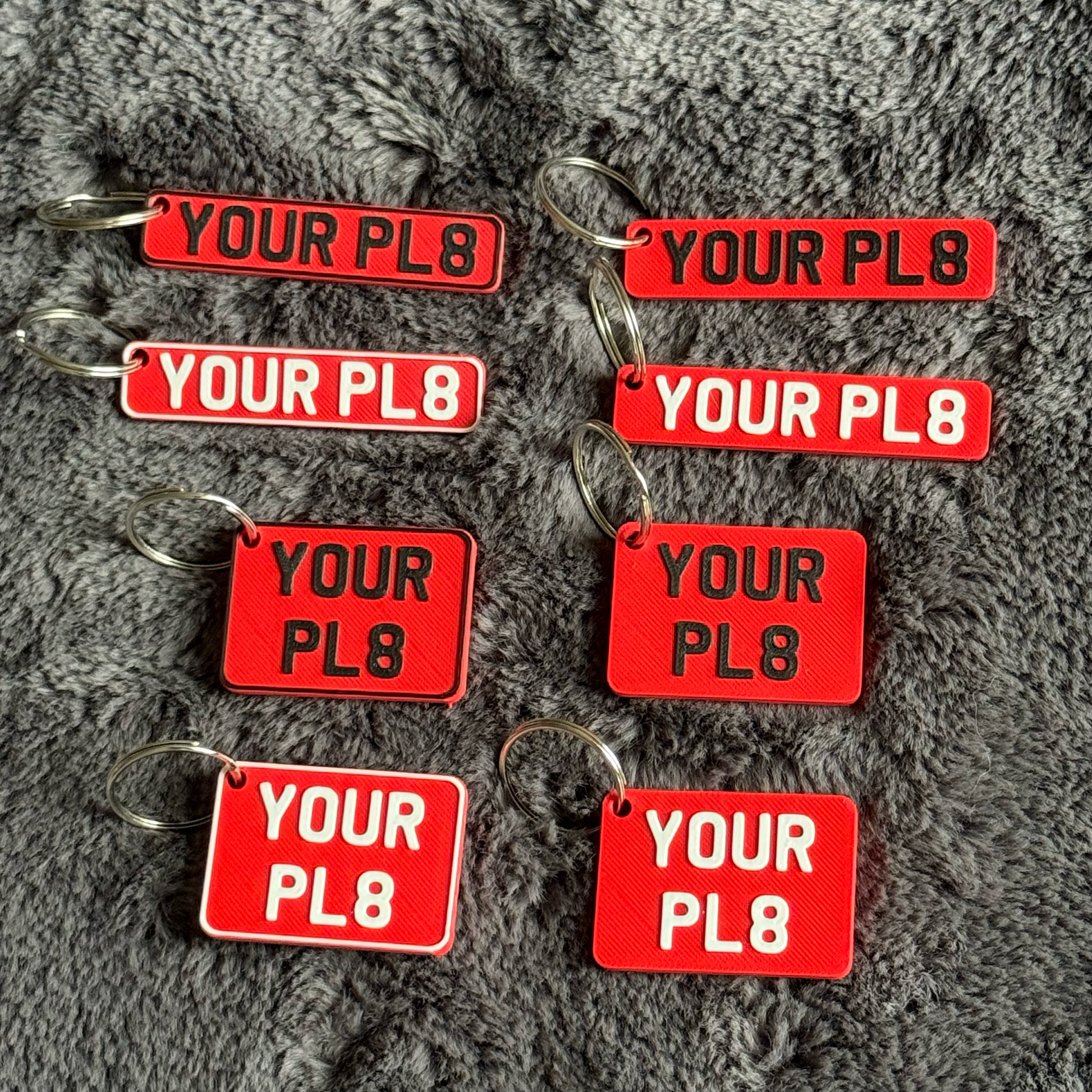 RED LICENSE PLATES WITH BLACK TEXT AND WHITE TEXT RECTANGULAR SHAPE AND SQUARE SHAPE