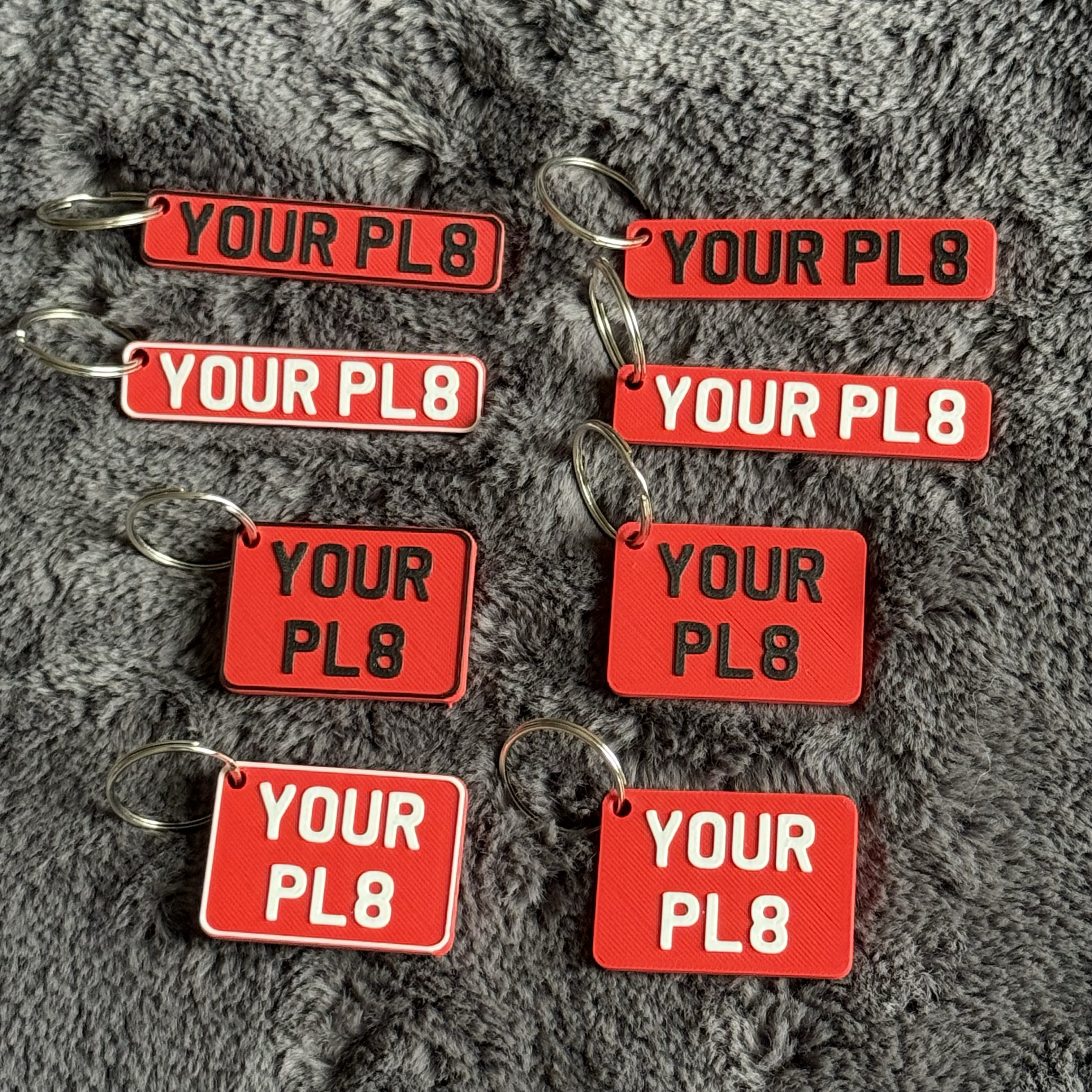 RED LICENSE PLATES WITH BLACK TEXT AND WHITE TEXT RECTANGULAR SHAPE AND SQUARE SHAPE