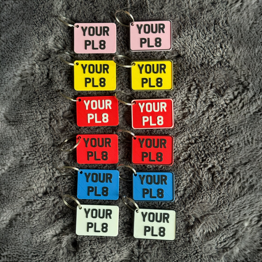 SQUARE DESIGNS LICENSE PLATES PINK YELLOW RED WITH WHITE TEXT RED WITH BLACK TEXT BLUE WHITE